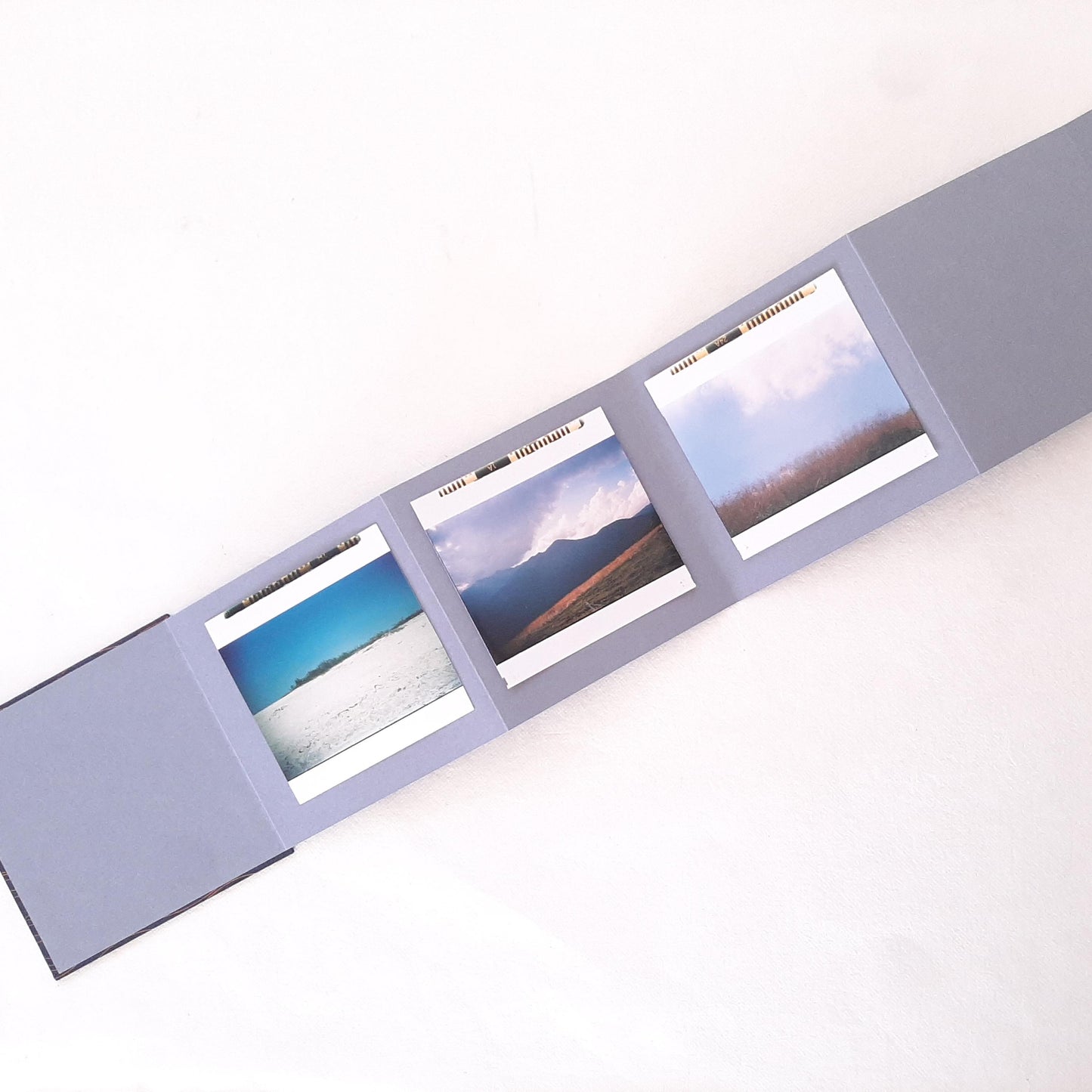 Mini album fotografico a fisarmonica in blu, oro e mandarino