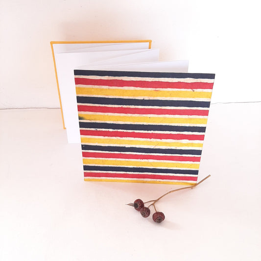 Mini album fotografico a fisarmonica con righe batik multicolori