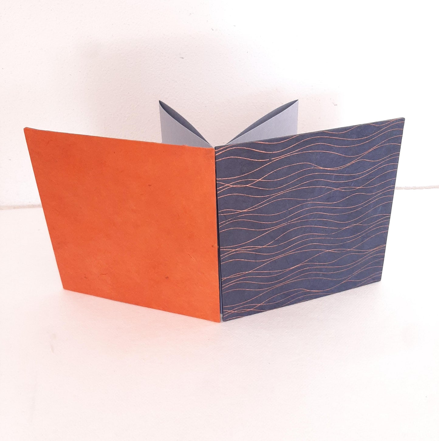 Mini album fotografico a fisarmonica in blu, oro e mandarino