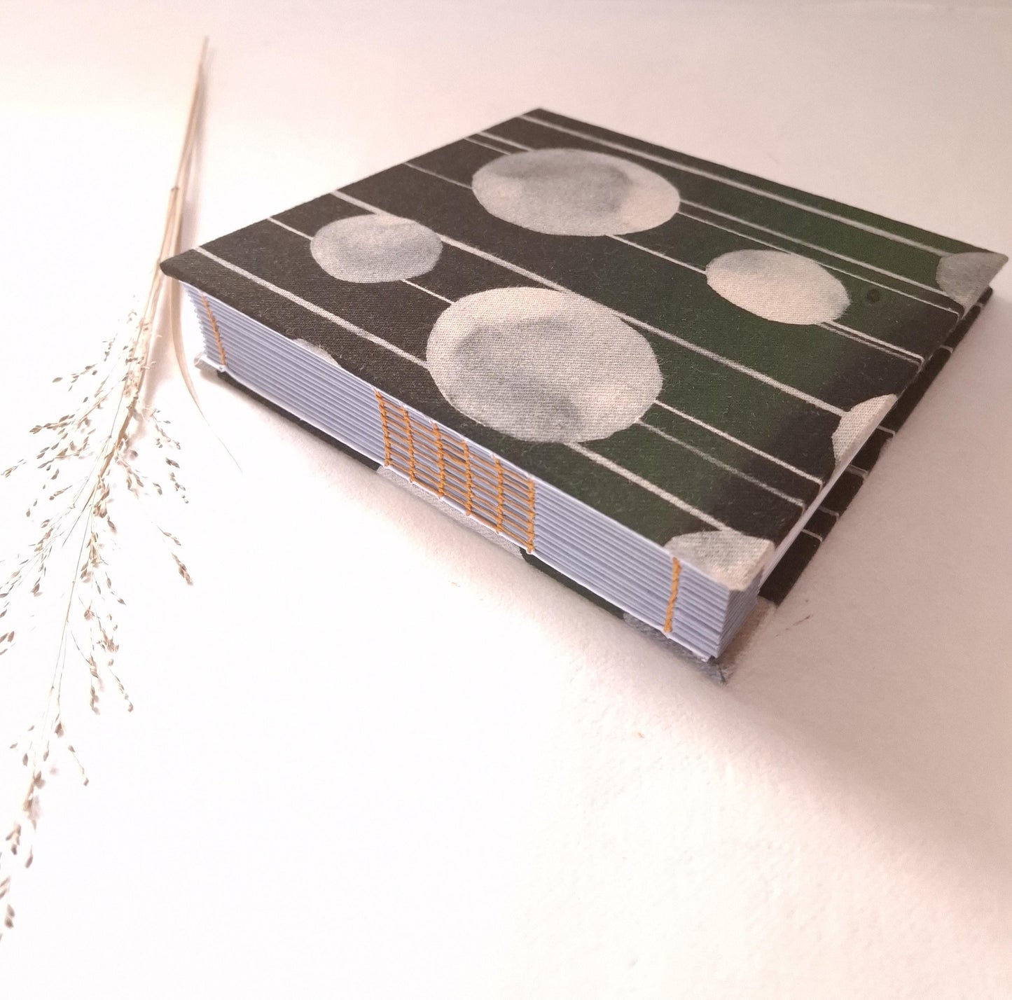 Album fotografico in tessuto Giapponese con cerchi in grigio e miele