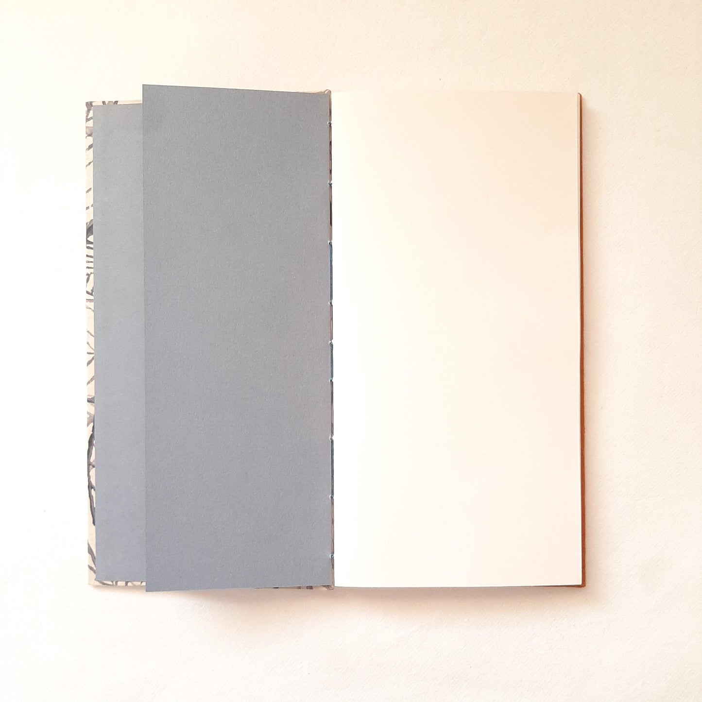 Taccuino per artista con stampa botanica di foglie in blu e ruggine