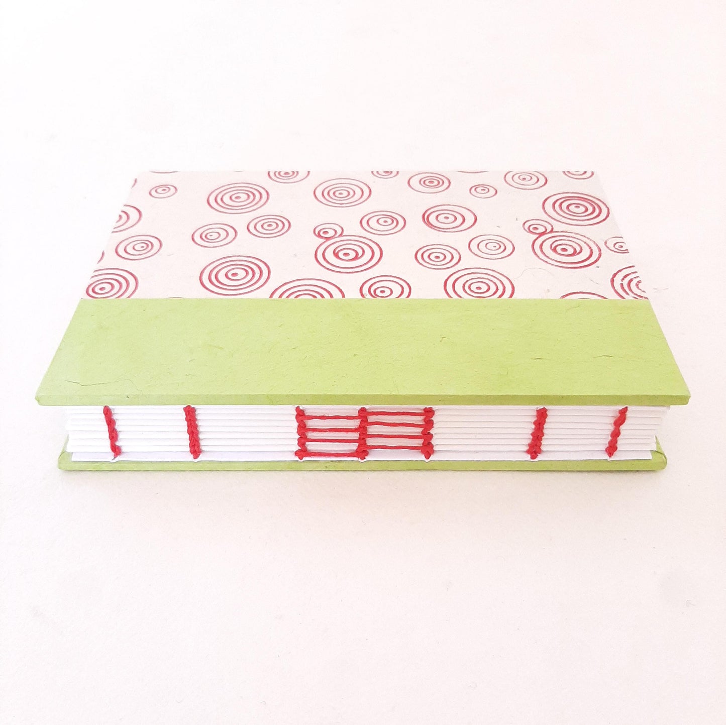 Quaderno tascabile per acquerello con spirali in rosso e verde pera