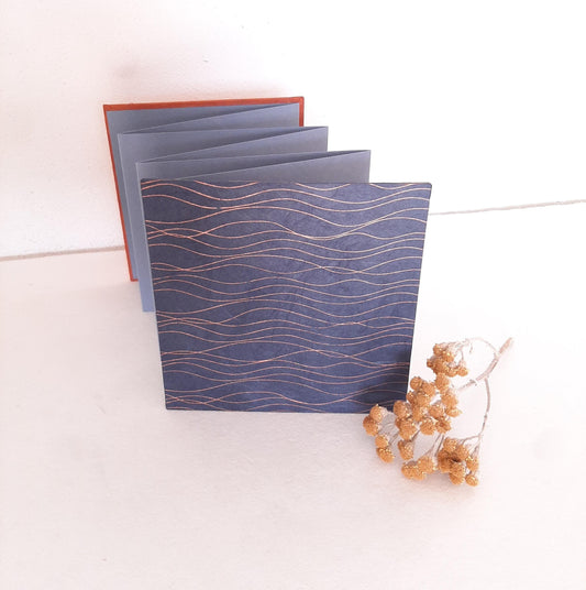 Mini album fotografico a fisarmonica in blu, oro e mandarino
