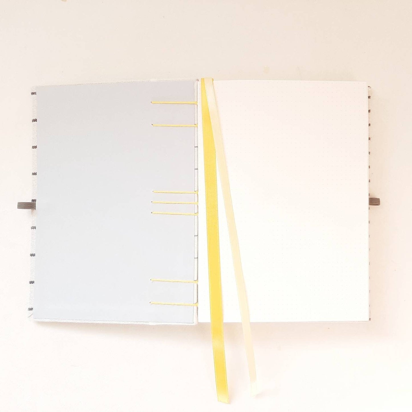 Diario A5 con pagine puntinate e tessuto geometrico nordico