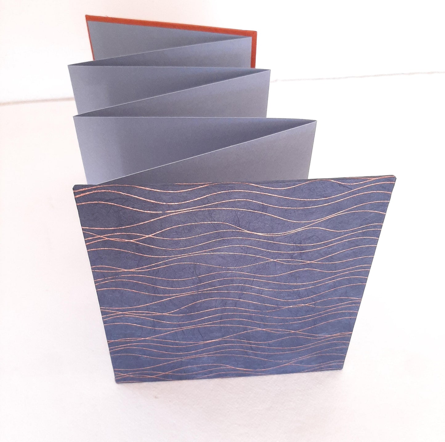 Mini album fotografico a fisarmonica in blu, oro e mandarino