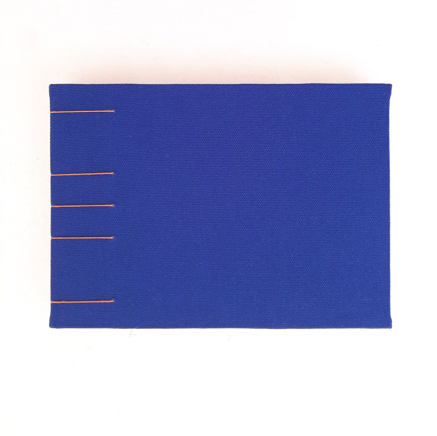 Quaderno A5 con pagine avorio e copertine in stoffa floreale in ocra e blu