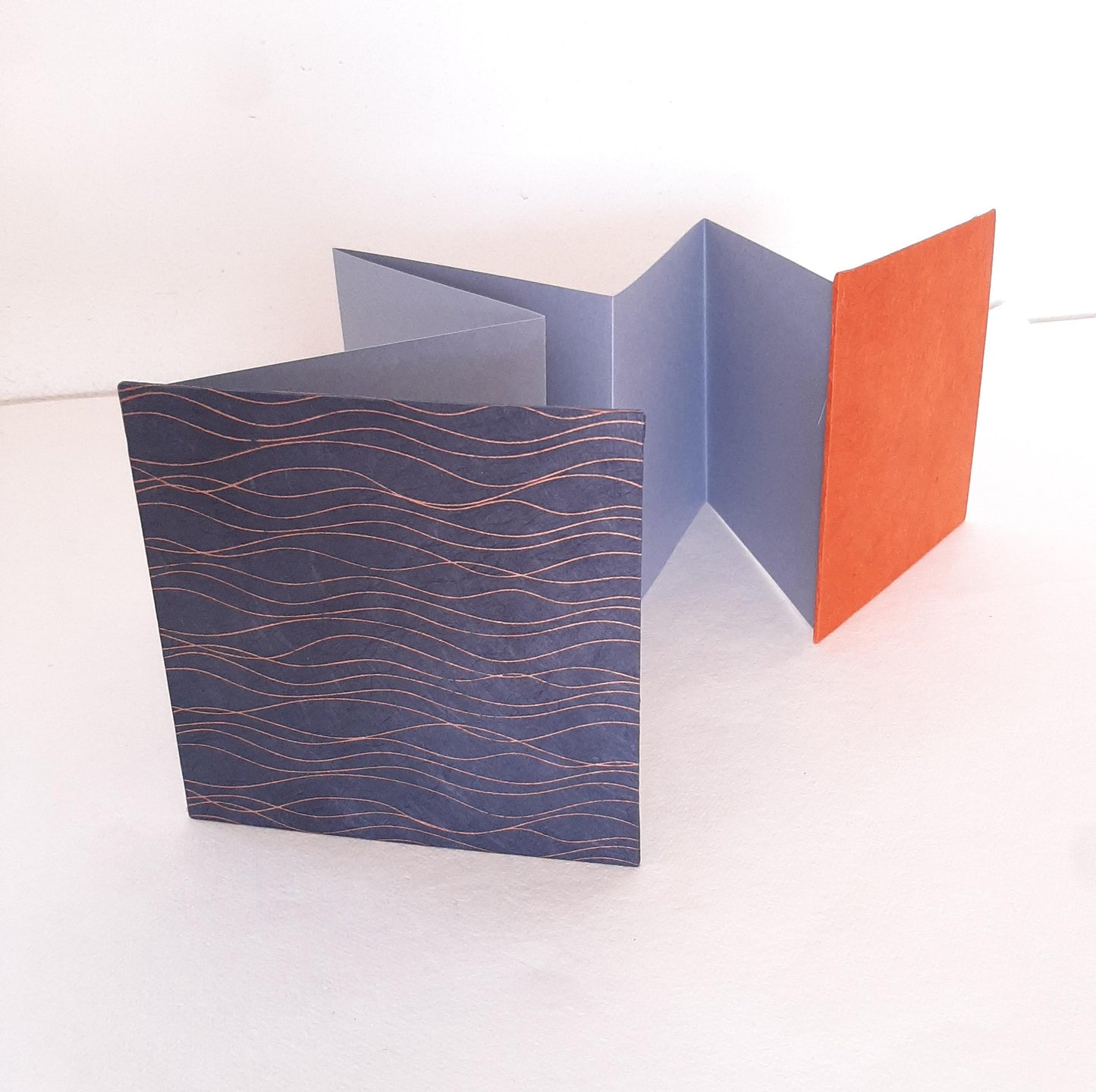 Mini album fotografico a fisarmonica in blu, oro e mandarino