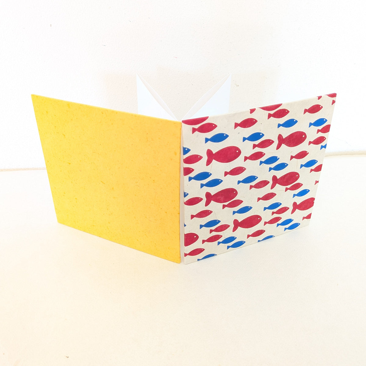 Mini album per istantanee con pesciolini