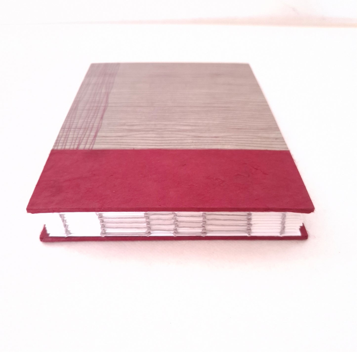 Taccuino per acquerello con intrecci in malva e bordeaux