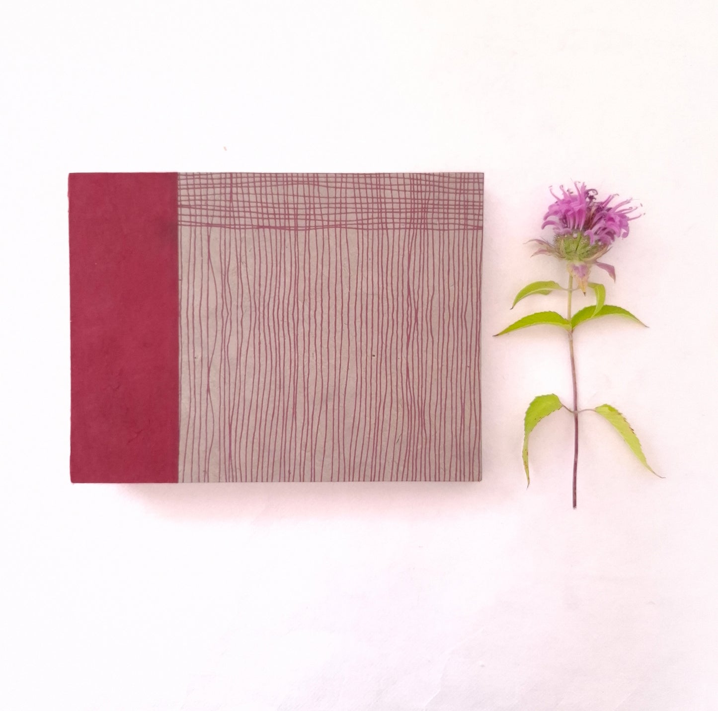 Taccuino per acquerello con intrecci in malva e bordeaux